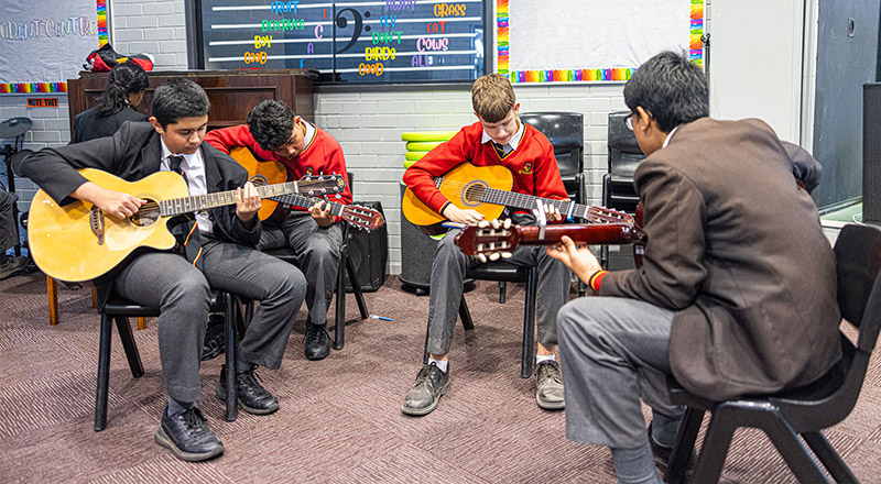 Music lesson at St Clare’s Catholic High School Hassall Grove