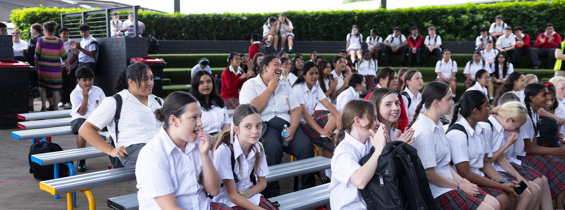 St Clare’s Hassall Grove students sitting in the amphitheatre
